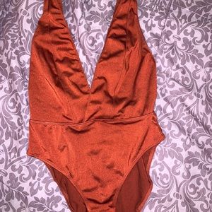 Burnt orange plunge bodysuit